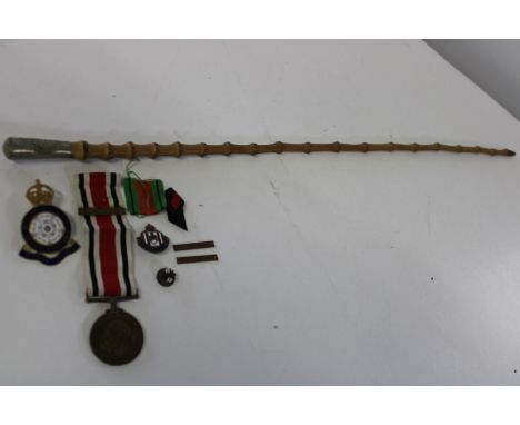 A military swagger stick &amp; selection of badges etc 