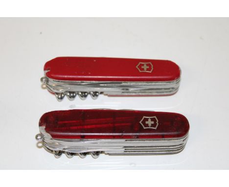 Two Swiss army pen knives 