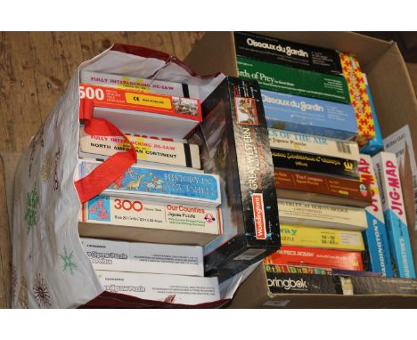 A large qty of vintage jigsaw puzzles 