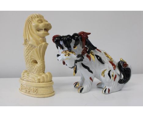 Two Oriental themed ceramic figures 