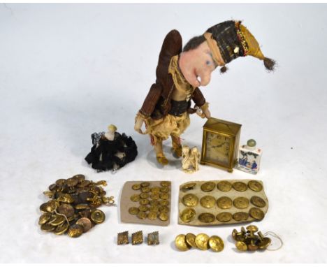 A 19th century stuffed cloth Mr. Punch doll, to/w a bisque doll's doll, various military and livery brass buttons, Mappin Zen