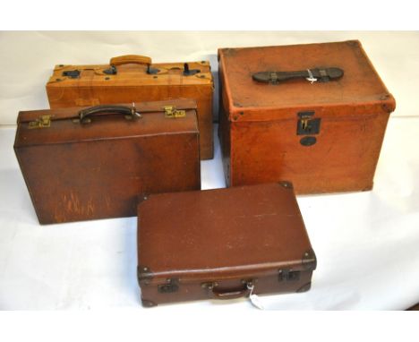 A vintage leather suitcase, a later leather suitcase, another suitcase and a small trunk (4)   Condition Report  Vintage suit