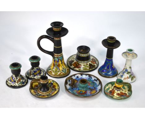 Gouda, Holland - Four chambersticks to/w a pair of short candlesticks and three others (9) Condition Report One of small blac