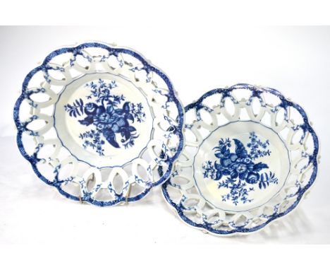 First period Worcester - a pair of blue and white pierced baskets, c. 1770's, the tapering sides pierced with intersecting ci