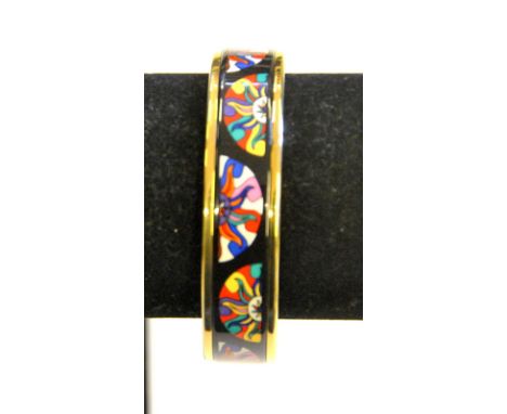 Patricia Rox - A polychrome enamel bangle featuring fan shaped motifs on black background, approx 1.5 cm wide, 6.5 cm inner d