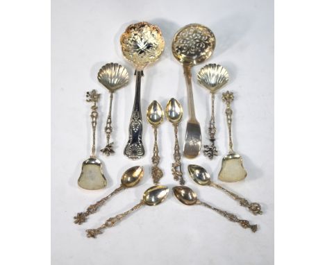 A Victorian silver fiddle pattern sifter ladle, Joseph & Albert Savory, London 1854, two pairs of .800 grade preserve spoons,