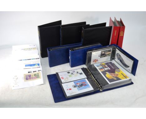 A large quantity of first day covers, loose and in nine albums (box)