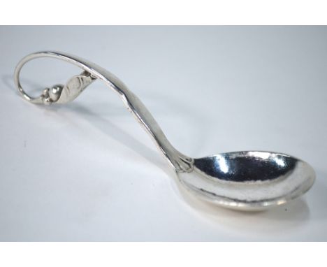 A Georg Jensen & Wendela Sterling sugar ladle design 21 with foliate scrolling stem (1945-51) Condition Report Good condition