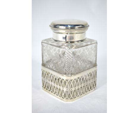A German square-cut glass tea caddy and stopper with strawberry-cut canted corners and wheel-etched floral decoration, with .