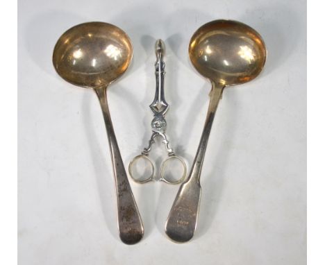 A pair of George III silver sugar nips, possibly James Graham c.1770, to/w An OEP sauce ladle, Mary & Elizabeth Sumner, Londo