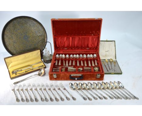 A French cased set of four Art Nouveau gilt metal serving spoons and fork with 800 grade handles, from Demerliac et Fils of L