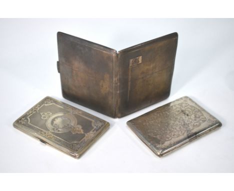 A Victorian engraved silver card case, George Unite, Birmingham 1876, a similar cigarette case with Indian-style engraving, B