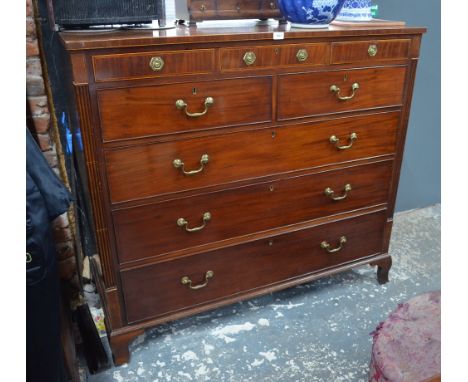 A Victorian mahogany chest of drawers of country house proportions, the three short diminutive drawers over two short and thr