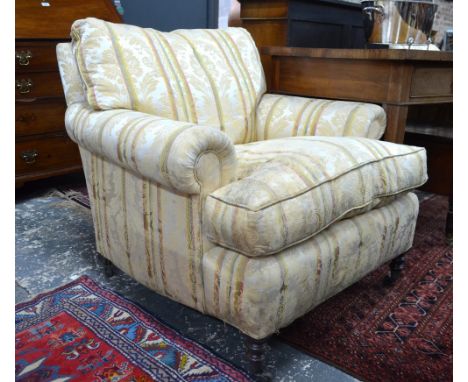 George Smith, London, a pair of Howard style easy armchairs upholstered in satin style traditional covers Condition Report On