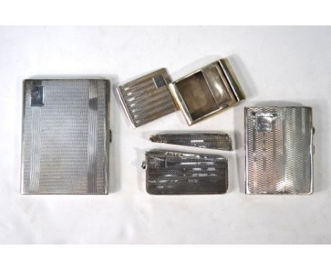 Two engine-turned cigarette cases, Birmingham 1929/35, to/w a somewhat similar visiting card case and a matchbox case, 9.2 oz