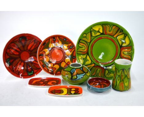 Poole Pottery Delphis wares comprising two vases, one shape 32 by Pamela Bevans, the other by Andrea Fontana to/w a charger, 