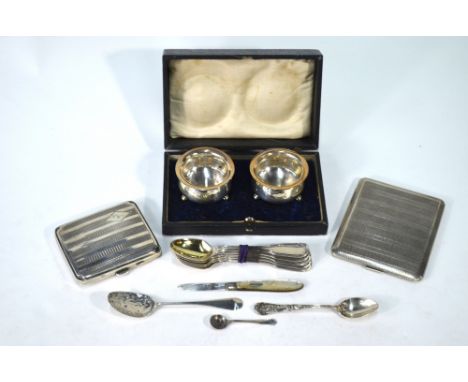Two engine-turned silver cigarette cases, Birmingham 1925/31, to/w five George III fiddle and thread egg-spoons with gilt bow