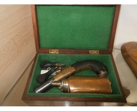 percusion pocket pistol by E.G.G of london, on box with flask, turn screw, and nipple key