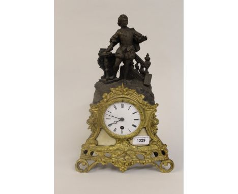 19th Century French gilded and dark patinated spelter single train mantel clock with figural surmount, 14ins high 