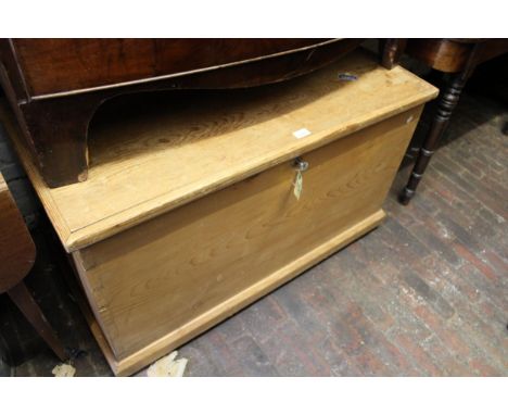 Early 20th Century stripped pine trunk with hinged cover, 41ins wide 