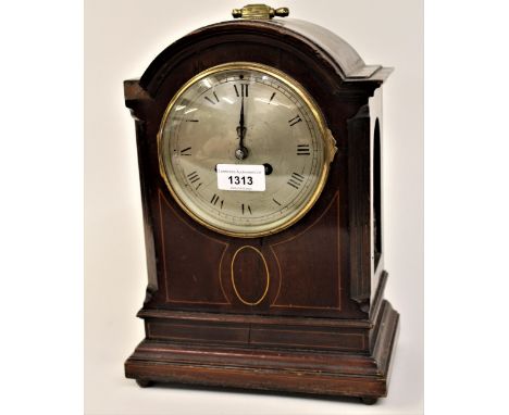 Edwardian mahogany line inlaid mantel clock having circular silvered dial with Roman numerals and two train movement striking