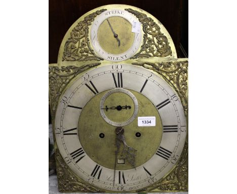 George III mahogany longcase clock with arched hood and door, the silvered and gilt brass dial inscribed John Scott London, w