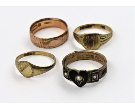 9ct Gold mourning ring dated 1911, together with three other various 9ct ringsWeight - 9.2gMourning ring - The heart shaped b