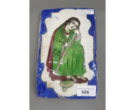 19th Century Qajar tile depicting a seated figure, 7.5ins x 5ins approximately 