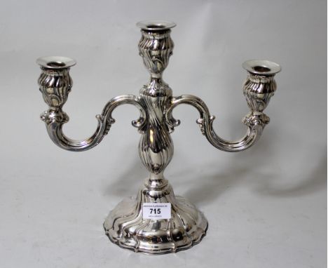 Continental silver (835 mark) three light candelabra, 11ins high, 15oz 