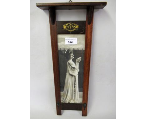 Unusual Arts and Crafts stained beechwood and metal mounted photograph frame inset with a portrait photograph of a lady 