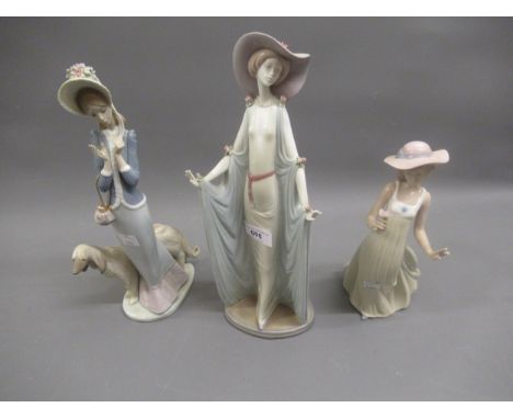 Lladro figure of an elegant lady in a shawl, another of a lady with an Afghan hound and another Nao figure of a girl holding 