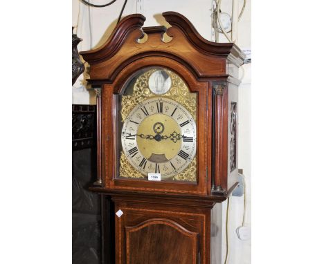 Edwardian mahogany and satinwood crossbanded longcase clock, the broken arch hood with a swan neck pediment and flanking Cori