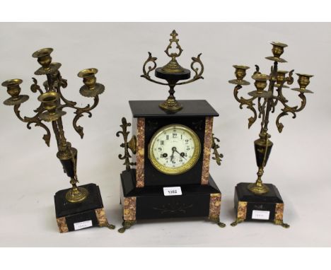 19th Century black slate and marble three piece clock garniture, the circular dial with Roman numerals and two train movement