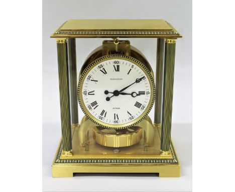 Jaeger-LeCoultre Atmos clock, the patinated and gilt brass four glass case with fluted column corners and gadroon moulding, t