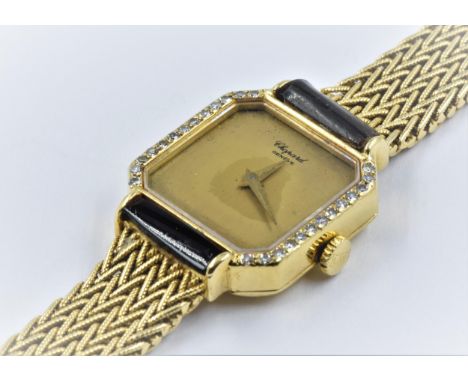 Ladies 18ct gold wristwatch by Chopard, the irregular octagonal gilt dial with plain tapering hands within a diamond set beze