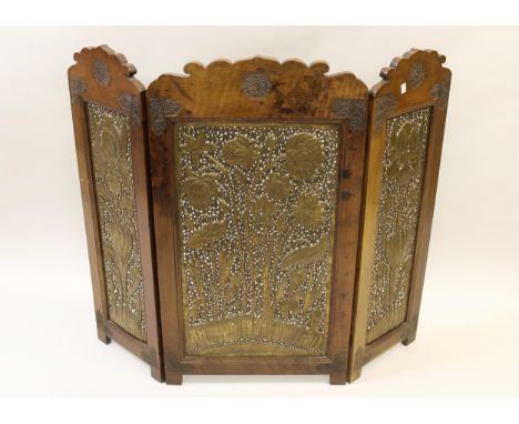 19th / early 20th Century Indian carved hardwood and pierced brass three section fireguard, the inset panels relief decorated