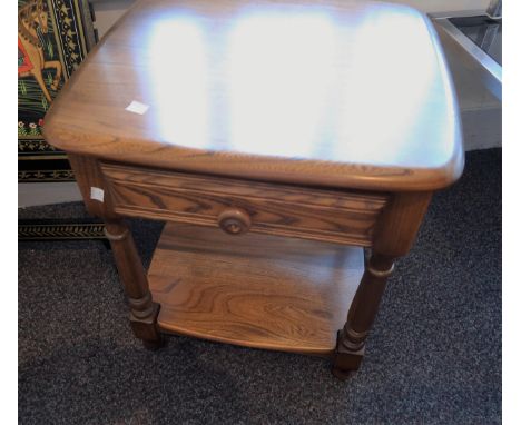 Small modern Ercol ash lamp table with a single drawer, turned supports and undertier, 19ins x 17.5ins x 21.5ns high 