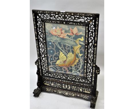 Late 19th / early 20th Century Chinese carved hardwood and mother of pearl inlaid firescreen with a needlework panelSome loss