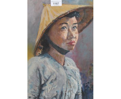 20th Century oil on card, head and shoulder portrait of an Eastern lady, signed indistinctly, 17ins x 14ins, framed 