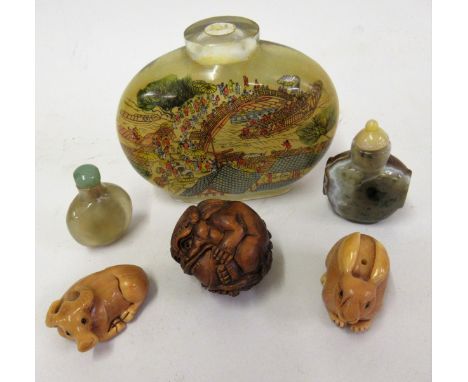 Large 20th Century Chinese snuff bottle with internal decoration, together with two similar, smaller snuff bottles, carved wo