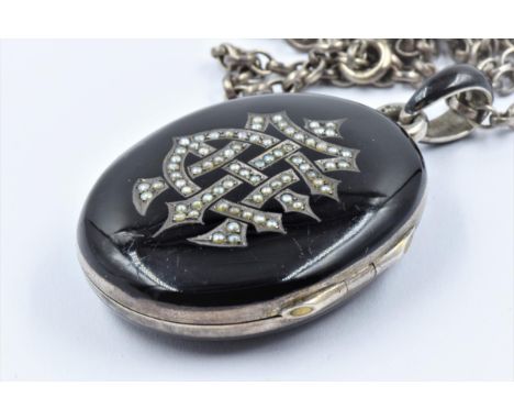 Victorian silver gilt black enamelled double locket bearing monogram, on a silver chain link necklaceMakers mark M.G and Fren