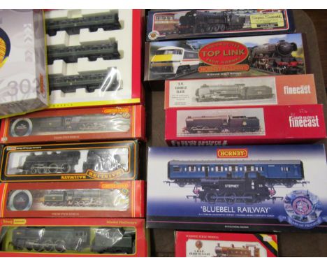 Quantity of boxed 00 gauge railway engines and carriages including Hornby, Mainline and Bachmann 