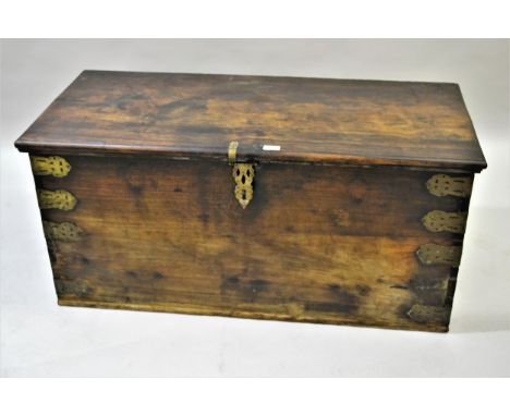 19th Century hardwood and brass mounted Zanzibar trunk, with hinged cover, 44ins x 19ins x 20ins high 