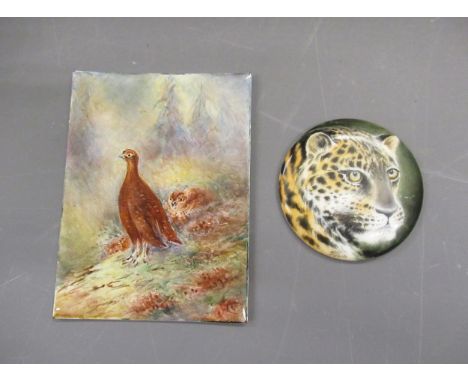 Small enamel plaque, painted with pheasant, together with a small circular porcelain plaque painted with a leopards head, sig