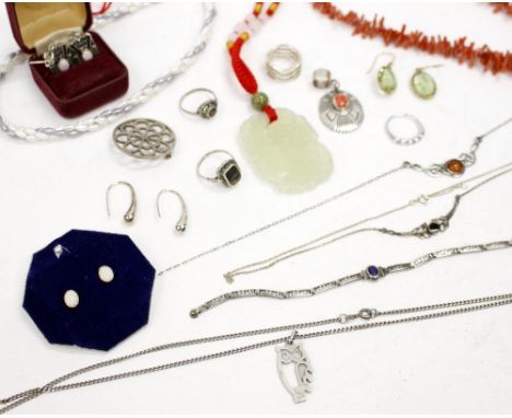 A COLLECTION OF JEWELLERY including a coral necklace, jade pendant, silver necklaces, rings, opal earrings, etc