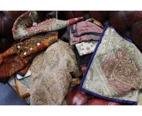 A SELECTION OF 20TH CENTURY TEXTILES including Kelim patterned cushion covers Middle Eastern inspired ceremonial drapes, crew