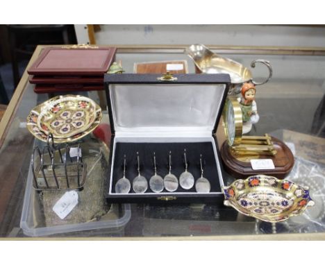 A GROUP OF THREE IMARI PATTERN DISHES, two Goebel figures, a boy and a girl, various photograph frames and other items 