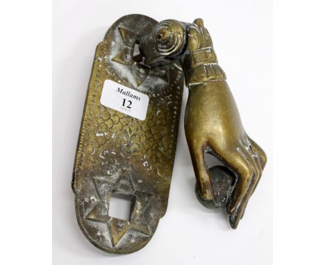 A 19TH CENTURY BRASS DOOR KNOCKER in the form of a hand, 19cm in length