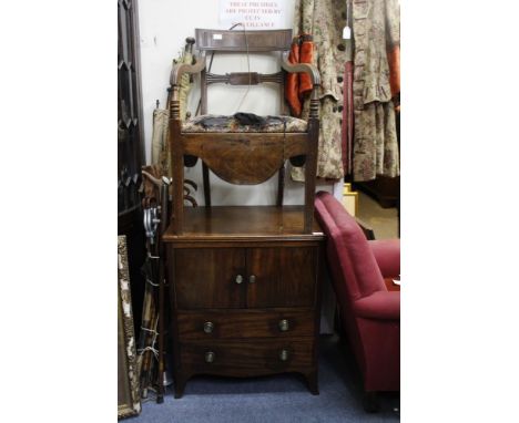 A LATE GEORGE III MAHOGANY COMMODE CHEST with hinged back above two cupboard doors and dummy drawers 63cm wide and a George I