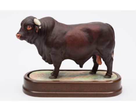 A Royal Worcester porcelain model of a Santa Gertrudis bull: modelled after the original by Doris Lindner, standing four squa